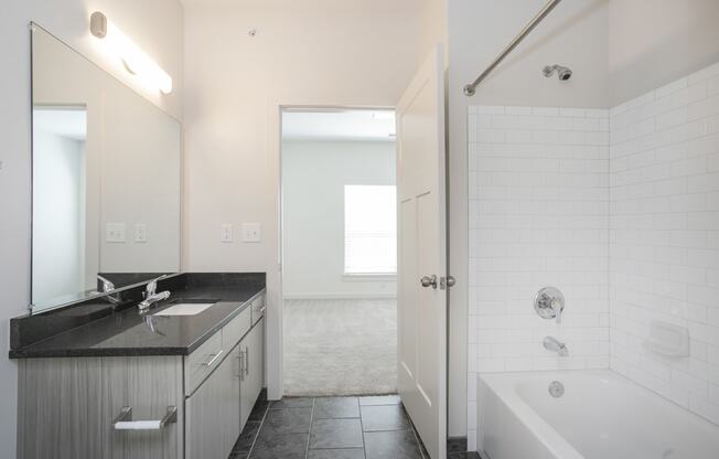 a bathroom with a sink and a bathtub