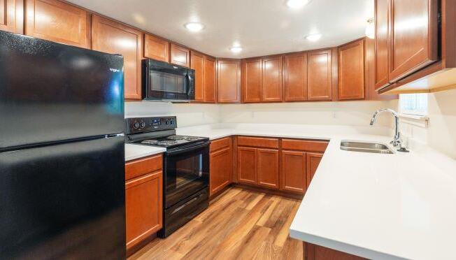 Fully Equipped Kitchen at Devonshire Court Apartments & Townhomes, North Logan, 84341