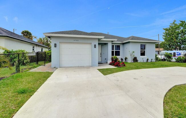 Gorgeous 3 bedroom Home in West Palm Beach on Corner Lot with Fenced backyard built in 2020