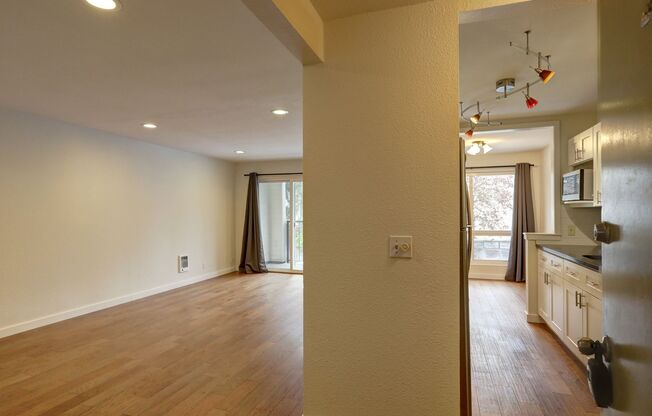 Prime Bellevue Location | 2 Bed Condo + Garage + Pool