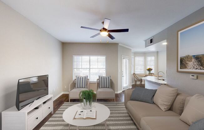 Spacious living room with ceiling fan at The Legends at Eagle Mountain Lake, Texas