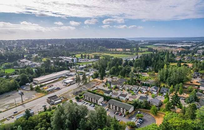 an aerial view of a city with cars parked in a parking lot at Sitka Heights, Washington 