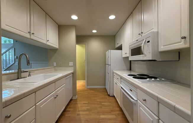Bright Cedar Mill Townhome-Style Home with Vaulted Living Room, Skylight, Garage & Modern Kitchen
