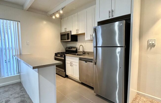 Upstairs 2-Bed/1-Bath Apartment with Parking and Additional Storage Available!