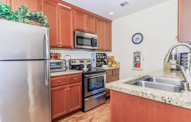 a stainless steel refrigerator in a kitchen