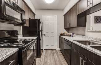 our apartments offer a modern kitchen with stainless steel appliances and granite counter tops