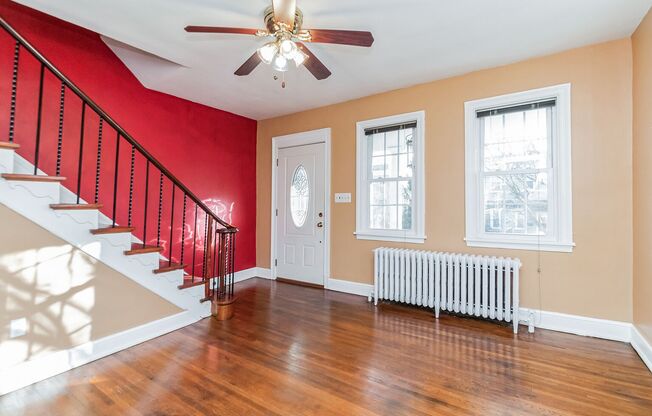 Newly updated 2Bd/1Bth end-unit rowhome nestled on a quiet street in the Brightwood community!