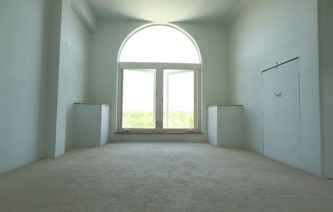 Spacious upper 3-bedroom unit with 2 full bathrooms in an attractive duplex.