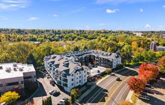 an aerial view of an apartment building in the city