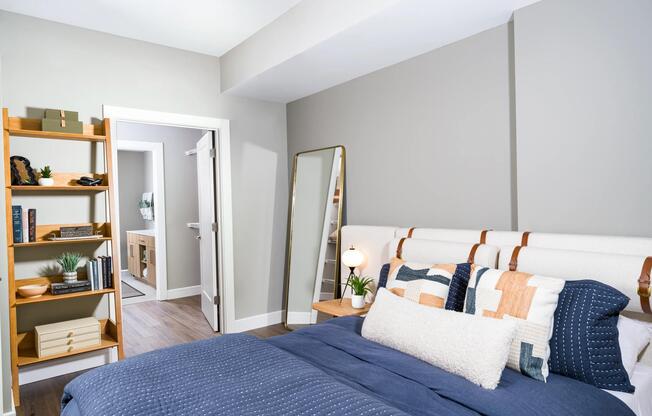 A serene primary bedroom, offering layered comfort and thoughtful design, with the rhythm of Nashville just beyond your door.