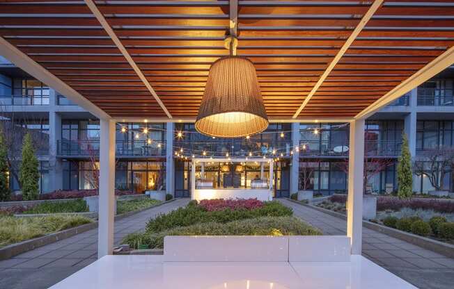 a view of the lobby of a building with a pendant light