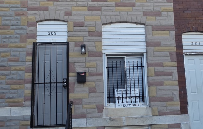 203 N CURLEY ST