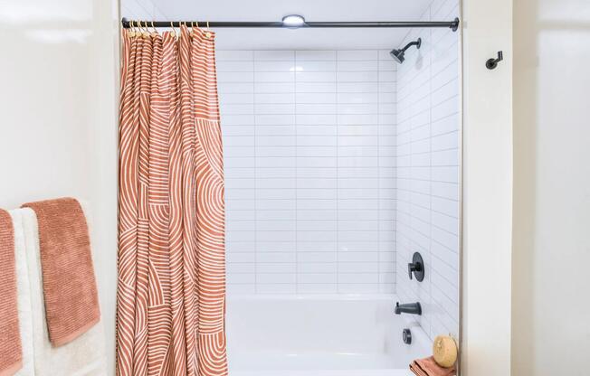 Spa-inspired bathrooms offer clean tile finishes, sleek fixtures, and a serene space to refresh and unwind.