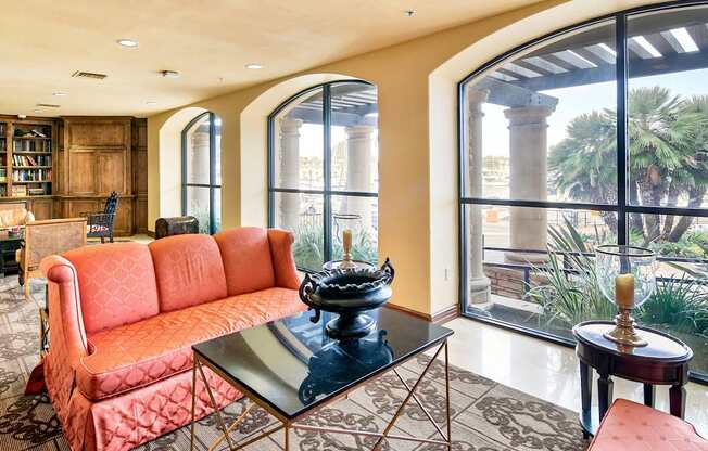 A living room with a red sofa and a glass coffee table at Marina Harbor, California, 90292
