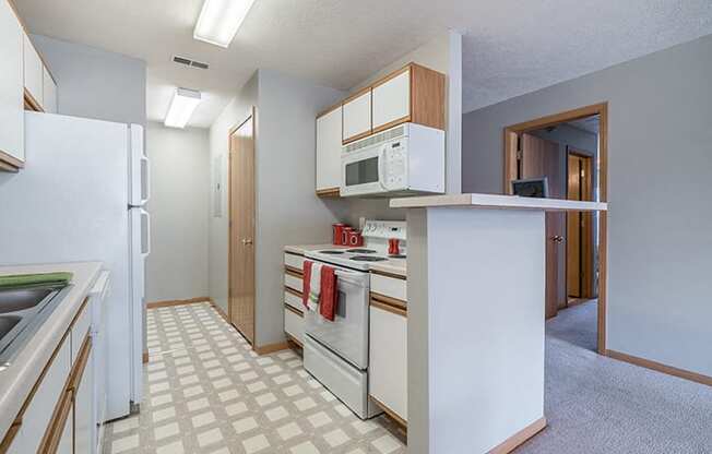 bright kitchen with lots of storage at Williamsburg Park Apartments in Lincoln NE