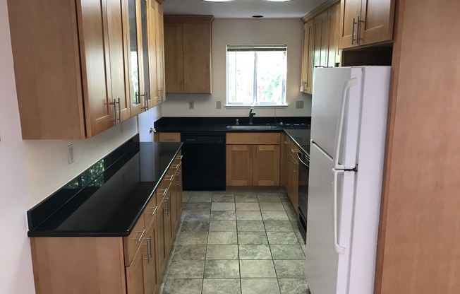 Beautiful House with Hardwood Floors & Granite Counters. Remodeled Bathroom