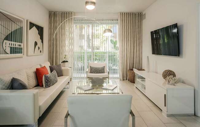 Light-Filled Living Area with Sliding Doors to Private Balcony