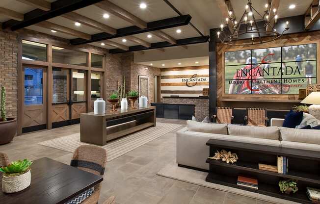 a living room filled with furniture and a large window