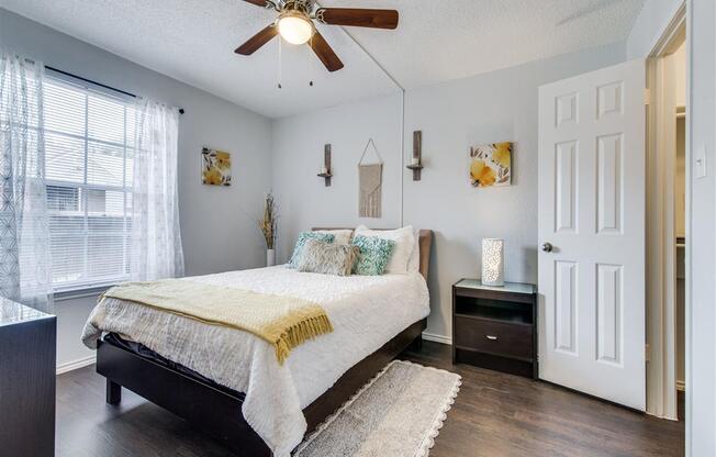 Beautiful Bright Bedroom With Wide Windows at Wildwood Apartments, CLEAR Property Management, Austin, Texas