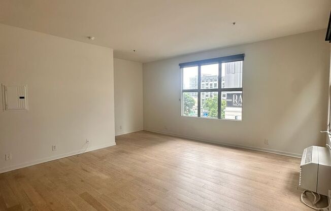 DOWNTOWN GEM | Modern Two-Level Loft with Private Patio & Rooftop Deck