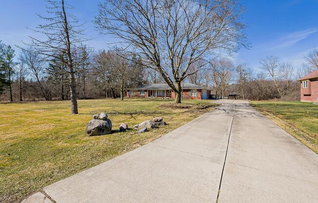 Welcome to this spacious 4 bedroom, 3 bathroom home in the desirable West Bloomfield Neighborhood of Michigan.