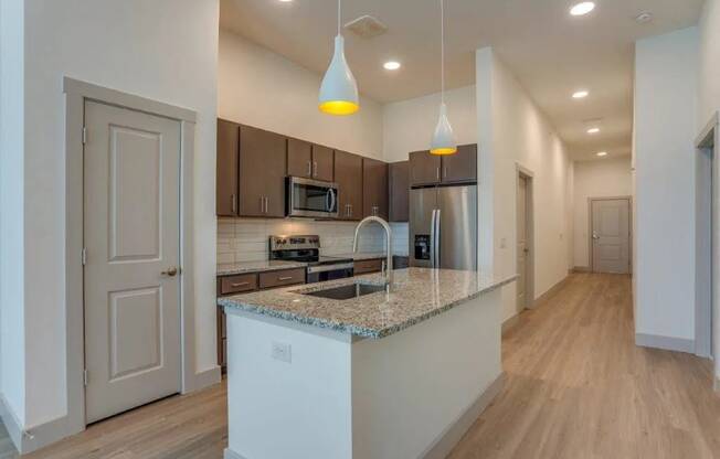 a kitchen with a counter top and