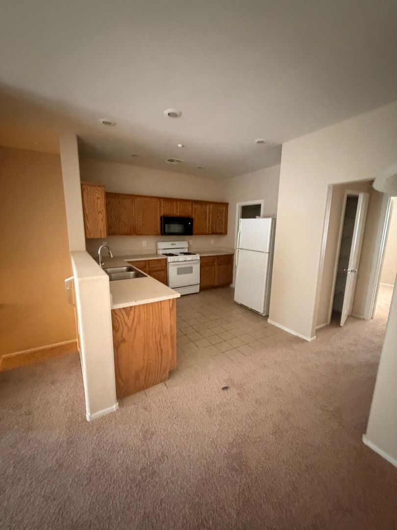 Spacious 3-story townhome located in a desirable gated community!