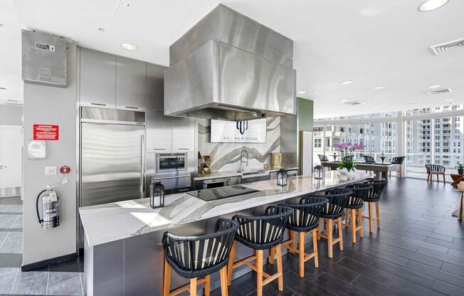 Sky Lounge Kitchen with a long counter and chairs.