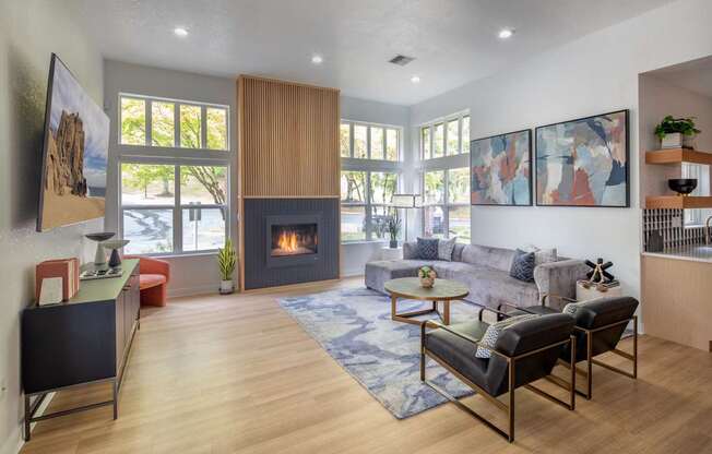 A living room with a fireplace and a couch.
