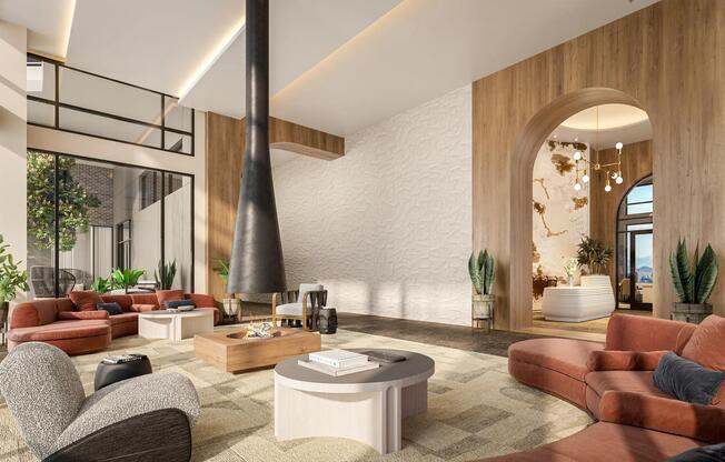 Hotel-inspired lobby lounge with fireplace, comfortable seating, and coffee bar.
