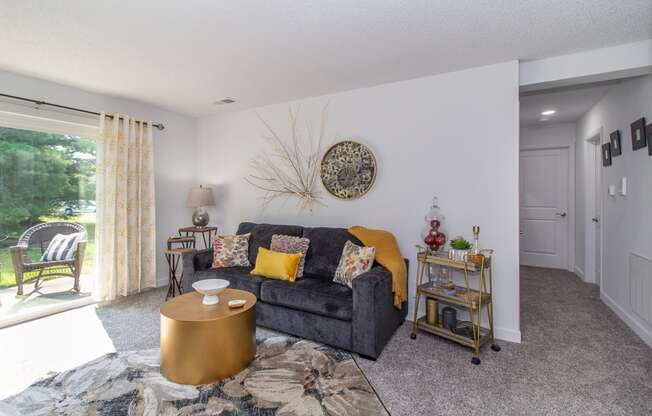 Living Room With Balcony at Timber Glen Apartments, Batavia, OH, 45103
