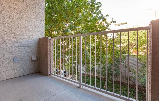 a gate in front of a brick building