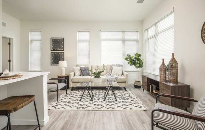 a living room with a couch and a table