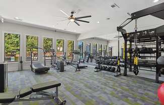 Community Fitness Center with Equipment at Retreat at Stonecrest Apartments located in Lithonia, GA.