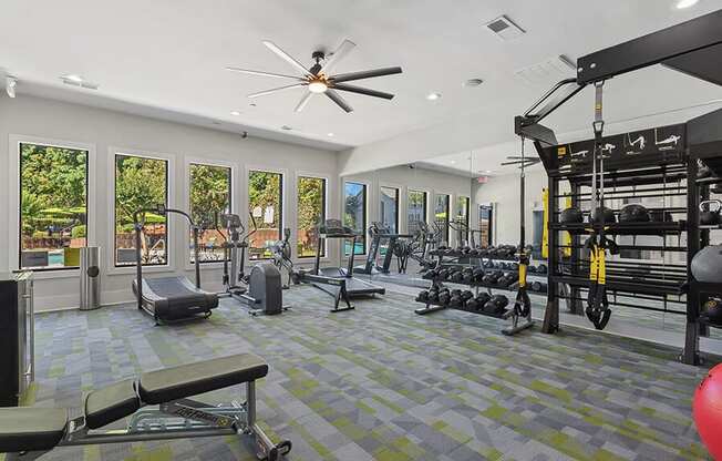 Community Fitness Center with Equipment at Retreat at Stonecrest Apartments located in Lithonia, GA.