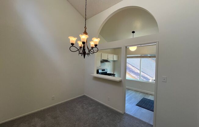 LOCATION! Move-in ready 2+2 w/parking, pool + balcony!