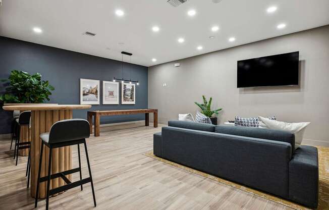 Resident lounge with multiple flat-screen TVs - Acadia at Cornerstar Apartments