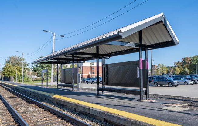 Covered MBTA platform near The Avens at Dedham offers a convenient connection for commuting throughout Greater Boston and beyond.