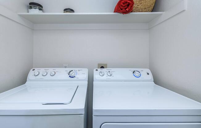 a stove top oven sitting next to a sink