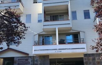 $2090 Green Lake 2 Story Condo W/ 2 balconies,2beds &1.5BA. W/D in the unit. Ready to move in.