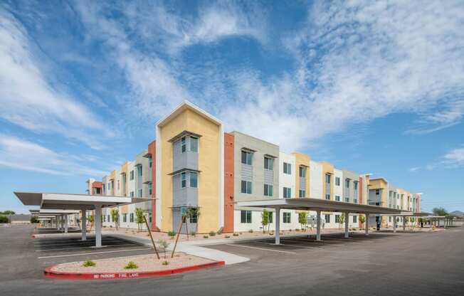 a building with a parking lot in front of it