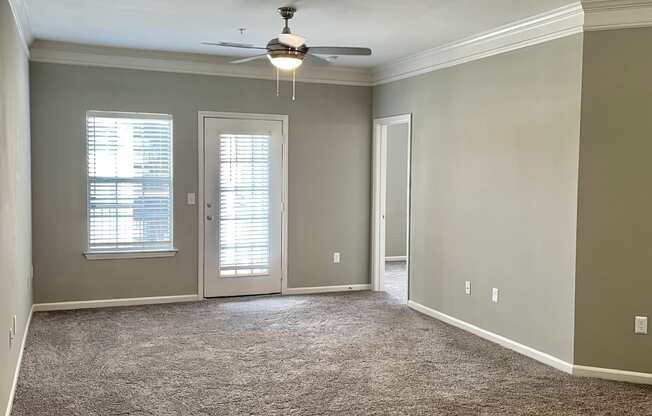 spacious living room with patio access