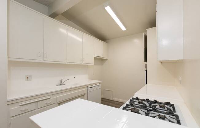 Kitchen with White Appliances and White Cabinets