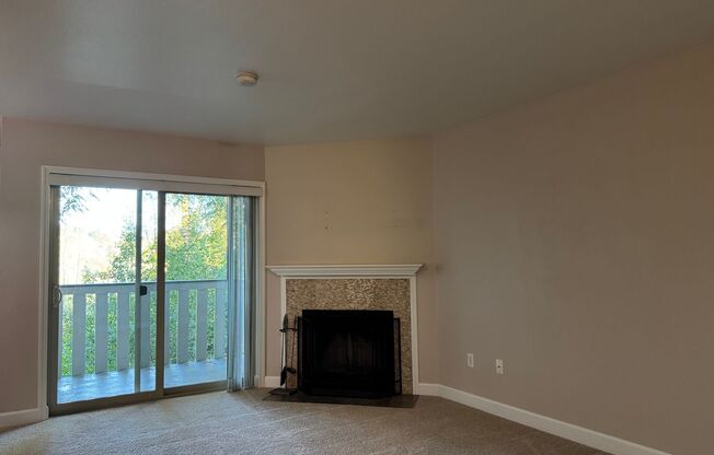 Serene Ground-Floor Condo Overlooking Green Space – Parking Included