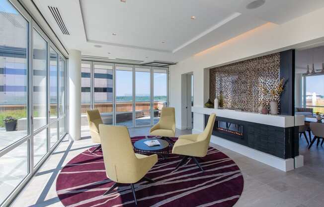 a living room filled with furniture and a fire place