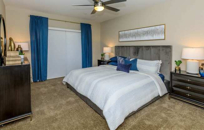 Bedroom with bed and ceiling fan at Level 25 at Sunset by Picerne, Nevada