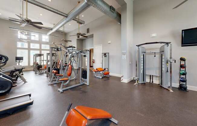 the gym at the flats at big tex apartments