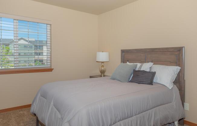 a bedroom with a bed in a hotel room