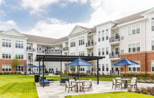 Building exterior with sitting area at 99 Bridge, New Jersey