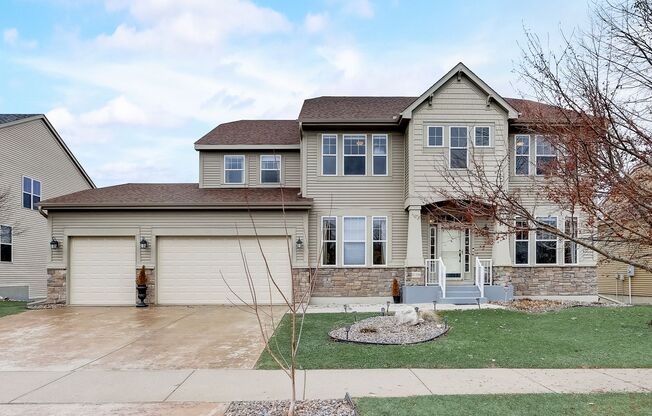 Grand 5 bed 4.5 bath Maple Grove Home w/ 3-Car Garage! Fully Furnished